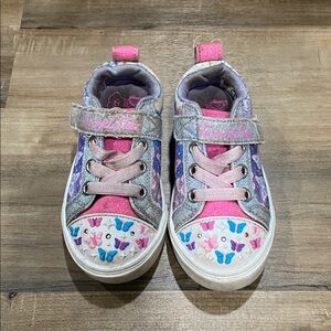 $2 - Colorful Kids' Sneakers with Butterfly Design